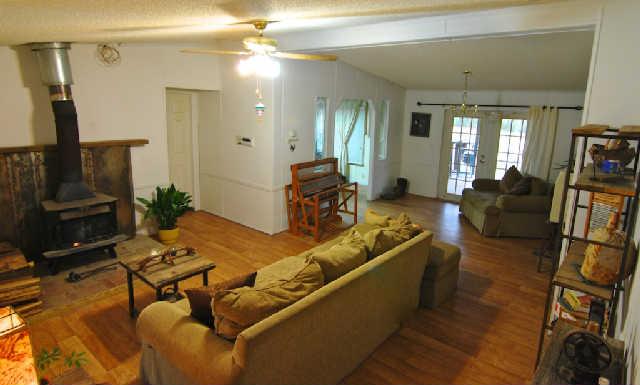200 Old Railroad Road Prospect, TN 38477 - Photo 3 of 20 a living room with furniture fireplace and a flat screen tv