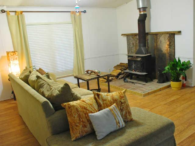 200 Old Railroad Road Prospect, TN 38477 - Photo 4 of 20 a living room with furniture and a flat screen tv