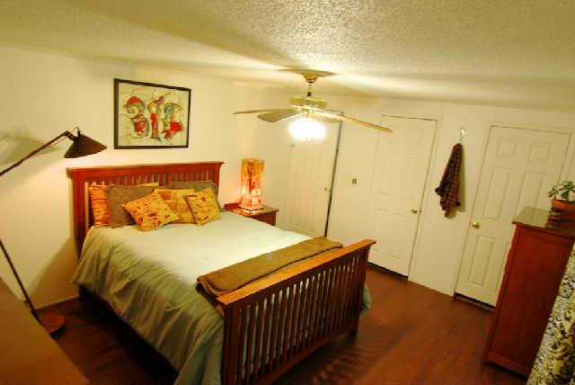 200 Old Railroad Road Prospect, TN 38477 - Photo 7 of 20 a bedroom with a bed and a walk in closet