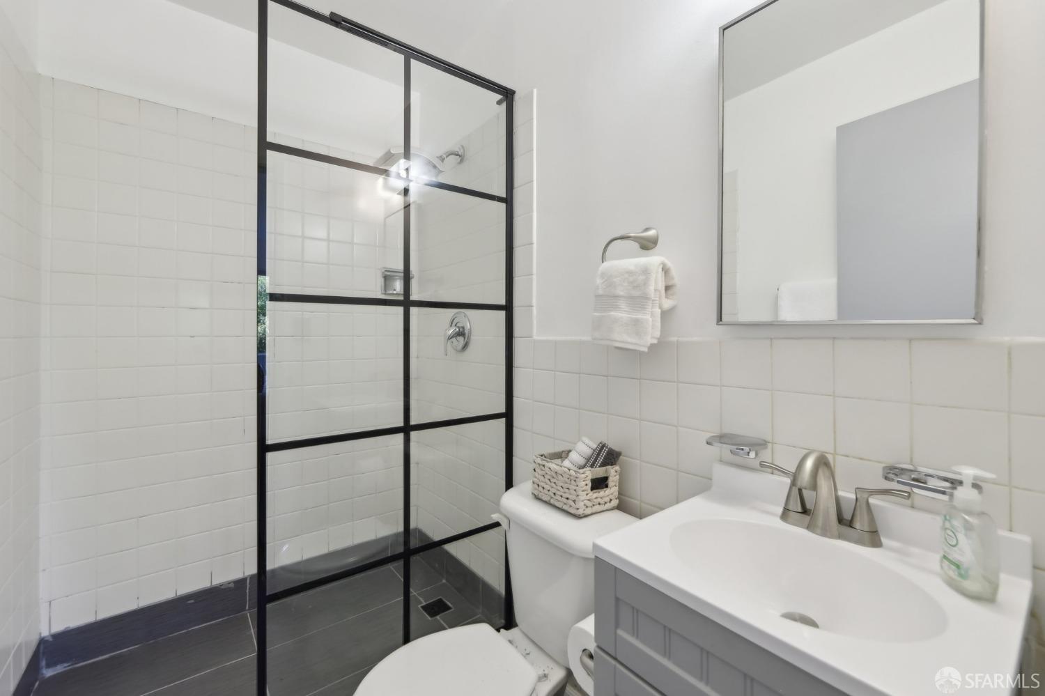 134 Albatross Court San Francisco, CA 94124 - Photo 16 of 40 a bathroom with a sink toilet and shower