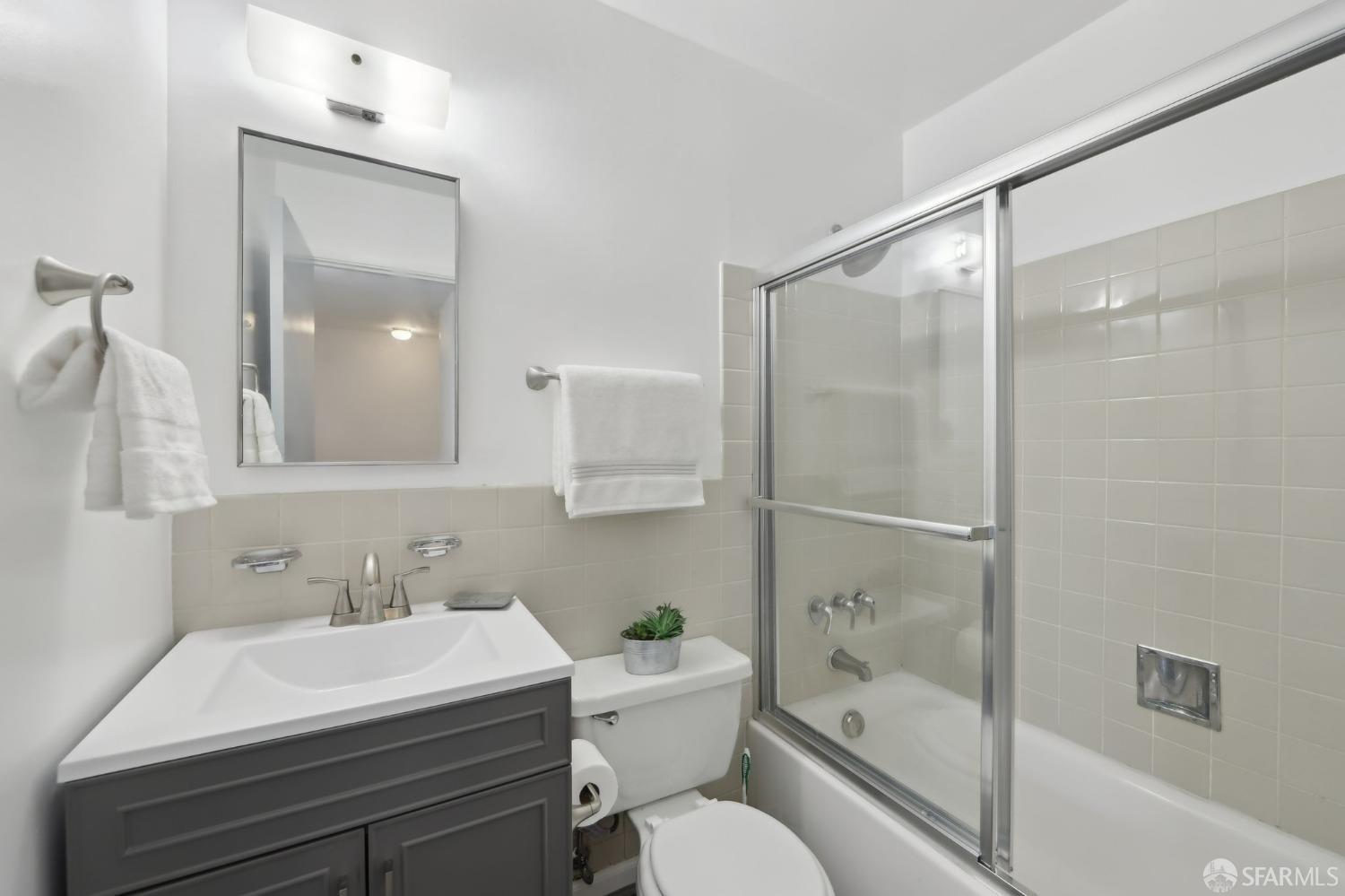 134 Albatross Court San Francisco, CA 94124 - Photo 17 of 40 a bathroom with a sink toilet and shower