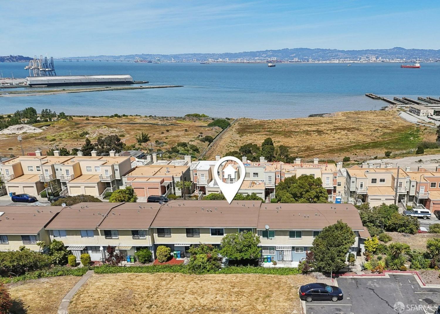 134 Albatross Court San Francisco, CA 94124 - Photo 20 of 40 an aerial view of a house with a lake view