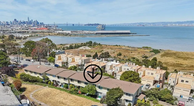 a view of a city and ocean view