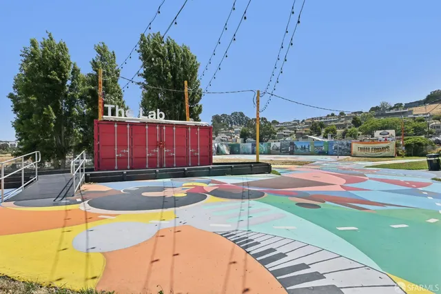 a view of a swimming pool with a yard
