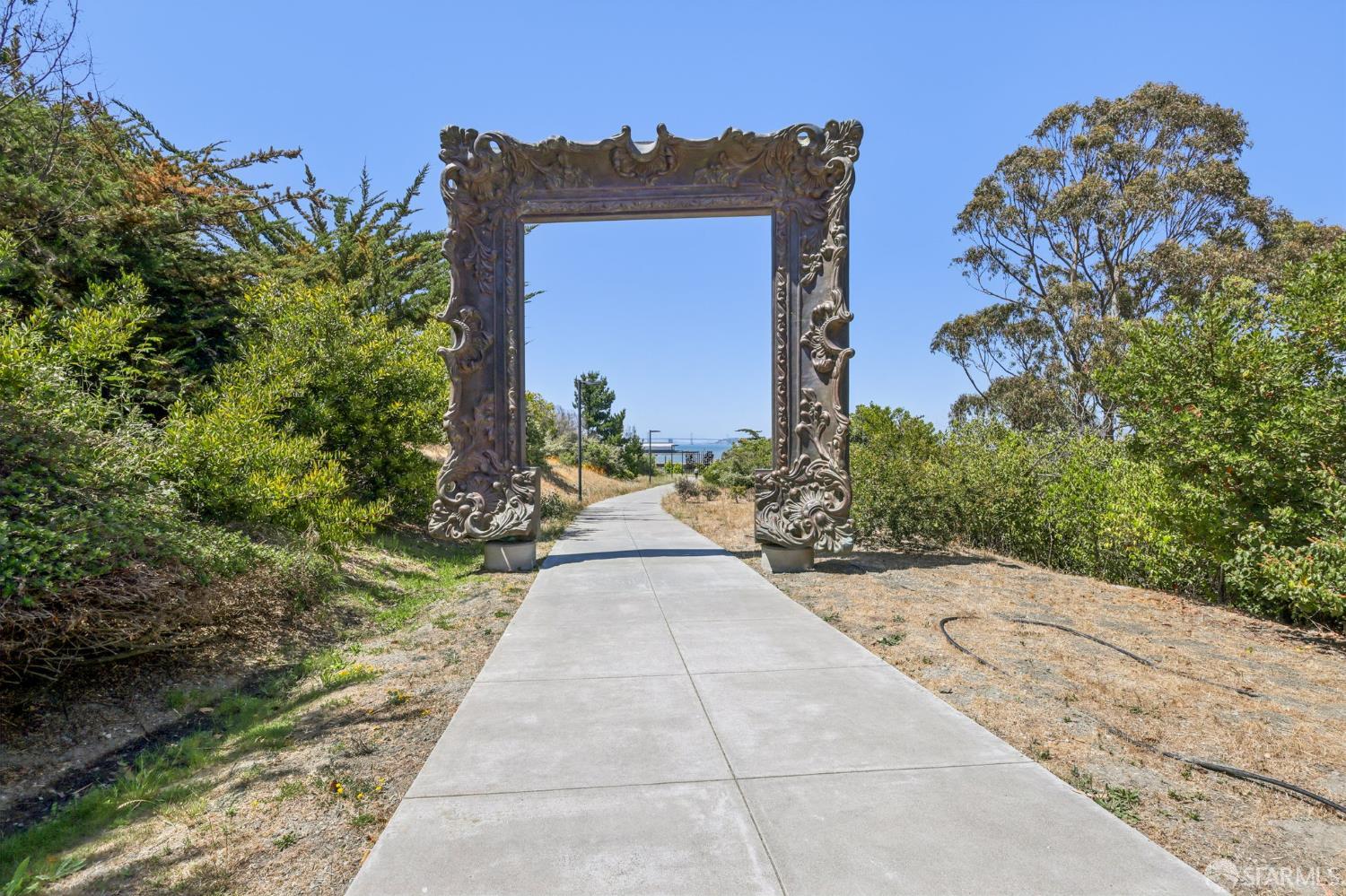134 Albatross Court San Francisco, CA 94124 - Photo 23 of 40 a view of a pathway with a small yard
