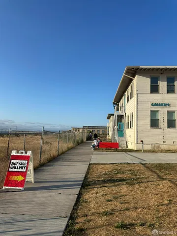 a view of swimming pool with an outdoor seating