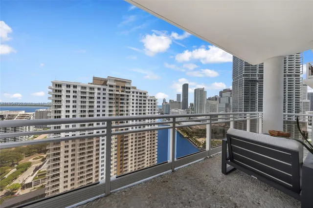 a balcony with a city view