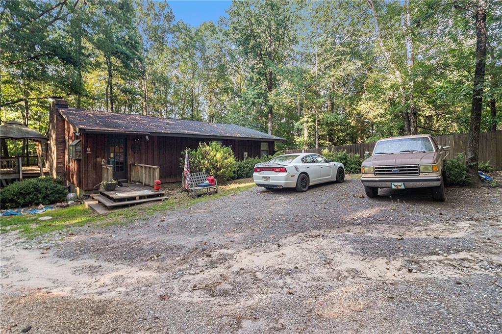 71 Bisson Woods Road Lexington, GA 30648 - Photo 1 of 1 a car parked in front of house