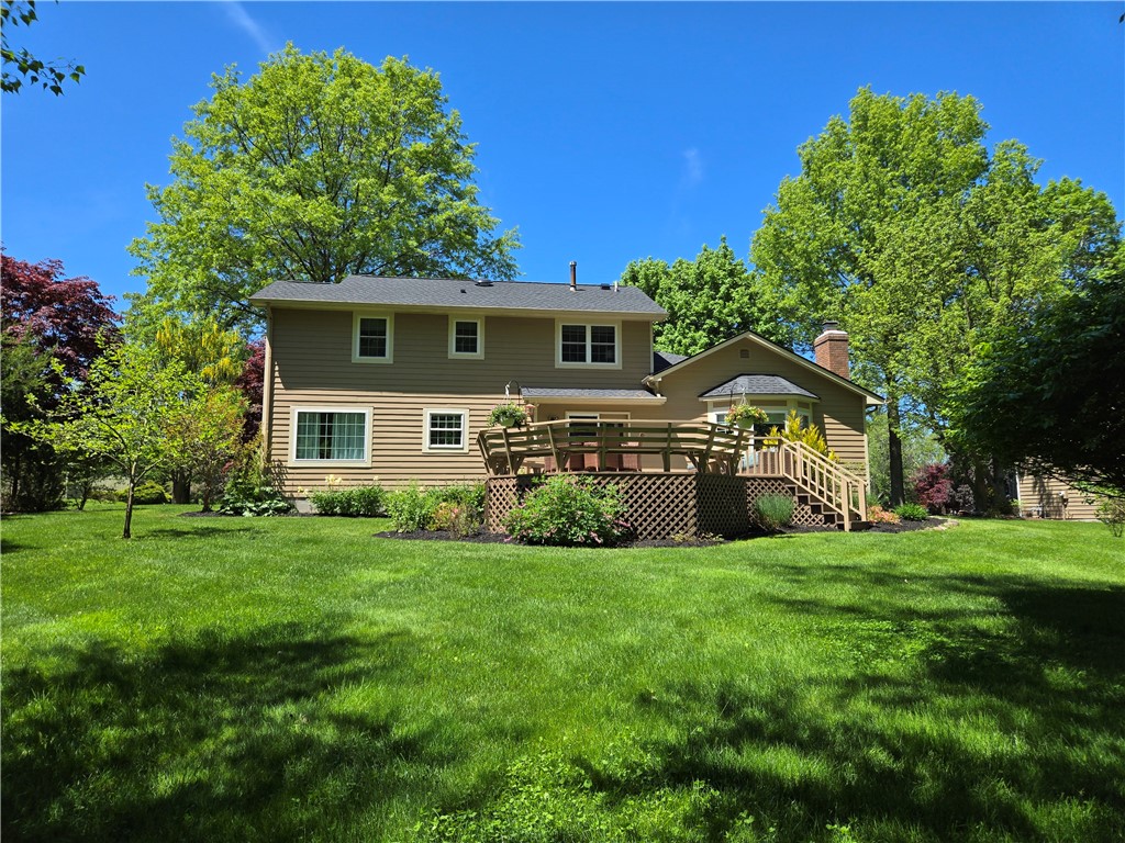 1081 Bright Stream Way Webster, NY 14580 - Photo 47 of 50 Another rear view from the fire pit.