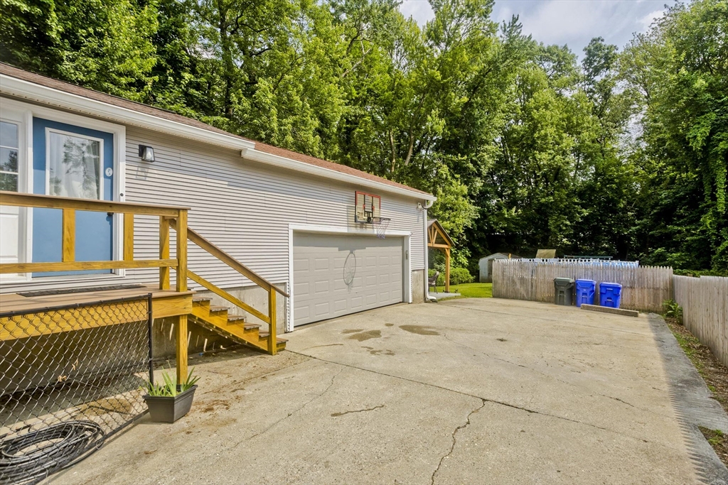 391 Plumtree Road Springfield, MA 01118 - Photo 3 of 42 a view of a house with backyard and sitting area