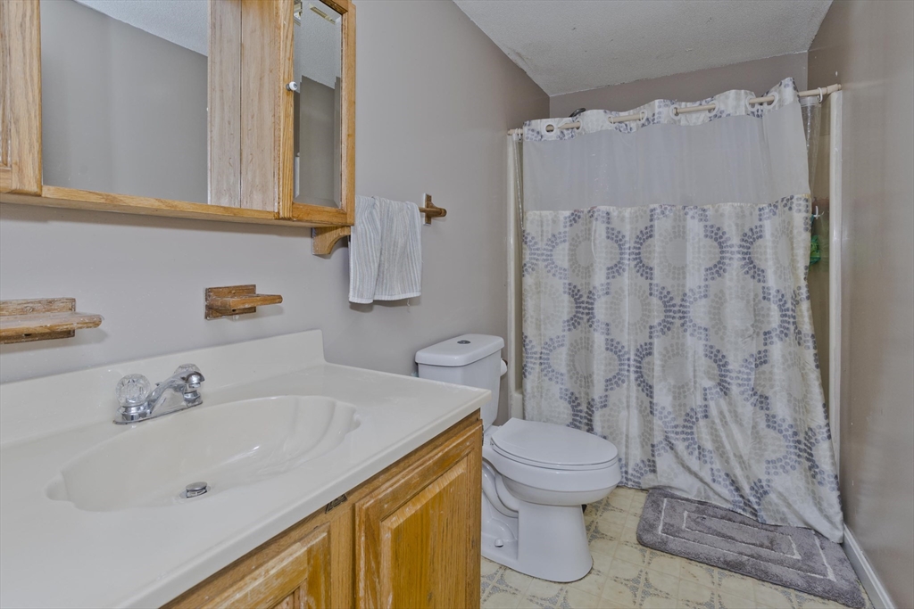 391 Plumtree Road Springfield, MA 01118 - Photo 32 of 42 a bathroom with a sink and a toilet