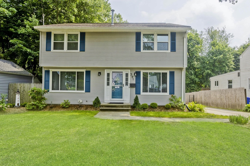 391 Plumtree Road Springfield, MA 01118 - Photo 42 of 42 a view of house with a yard