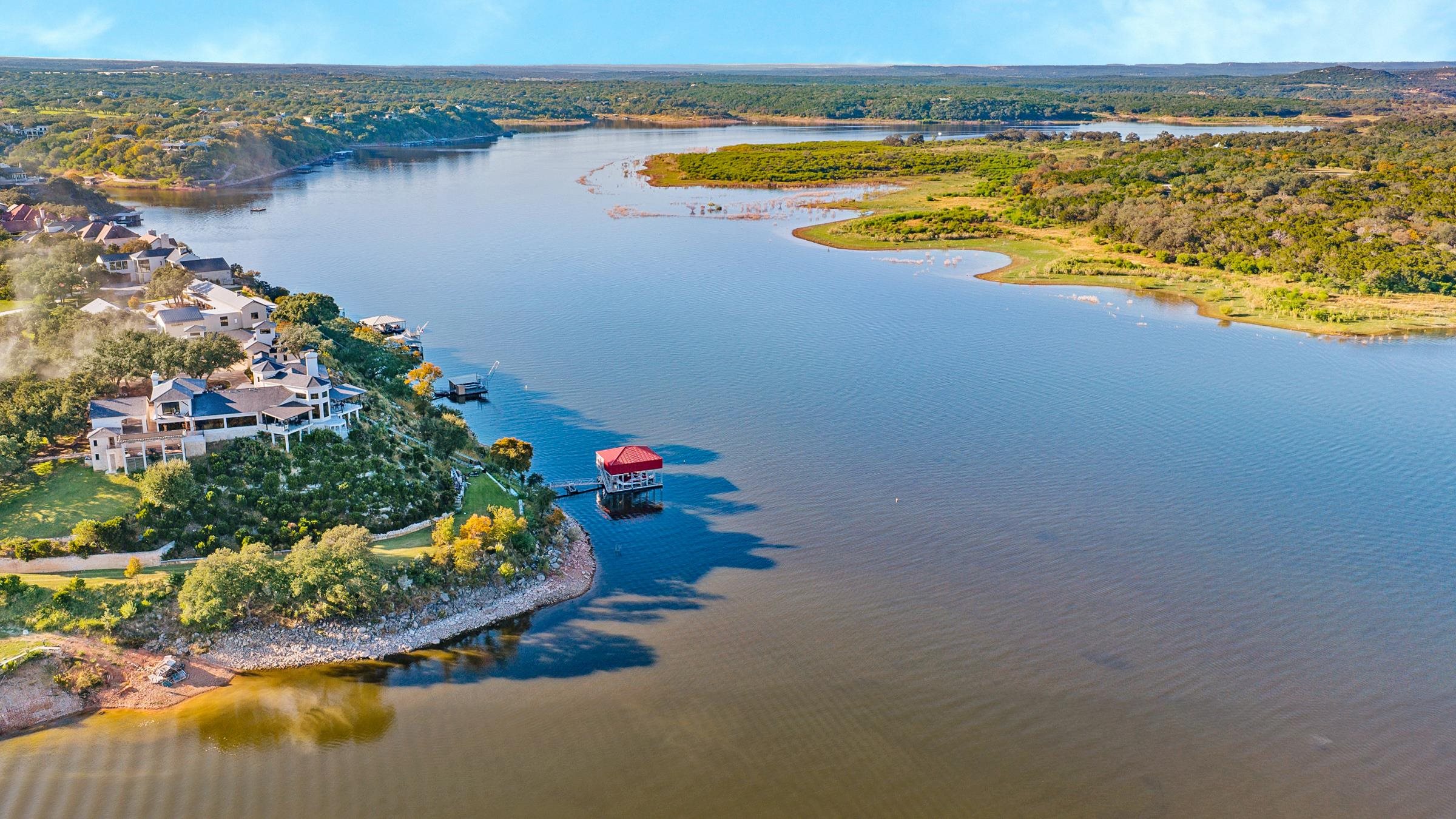 25700 Cliff Circle Spicewood, TX 78669 - Photo 16 of 25 a view of a lake and a mountain view