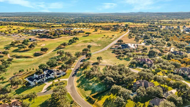 a view of swimming pool from a lake view