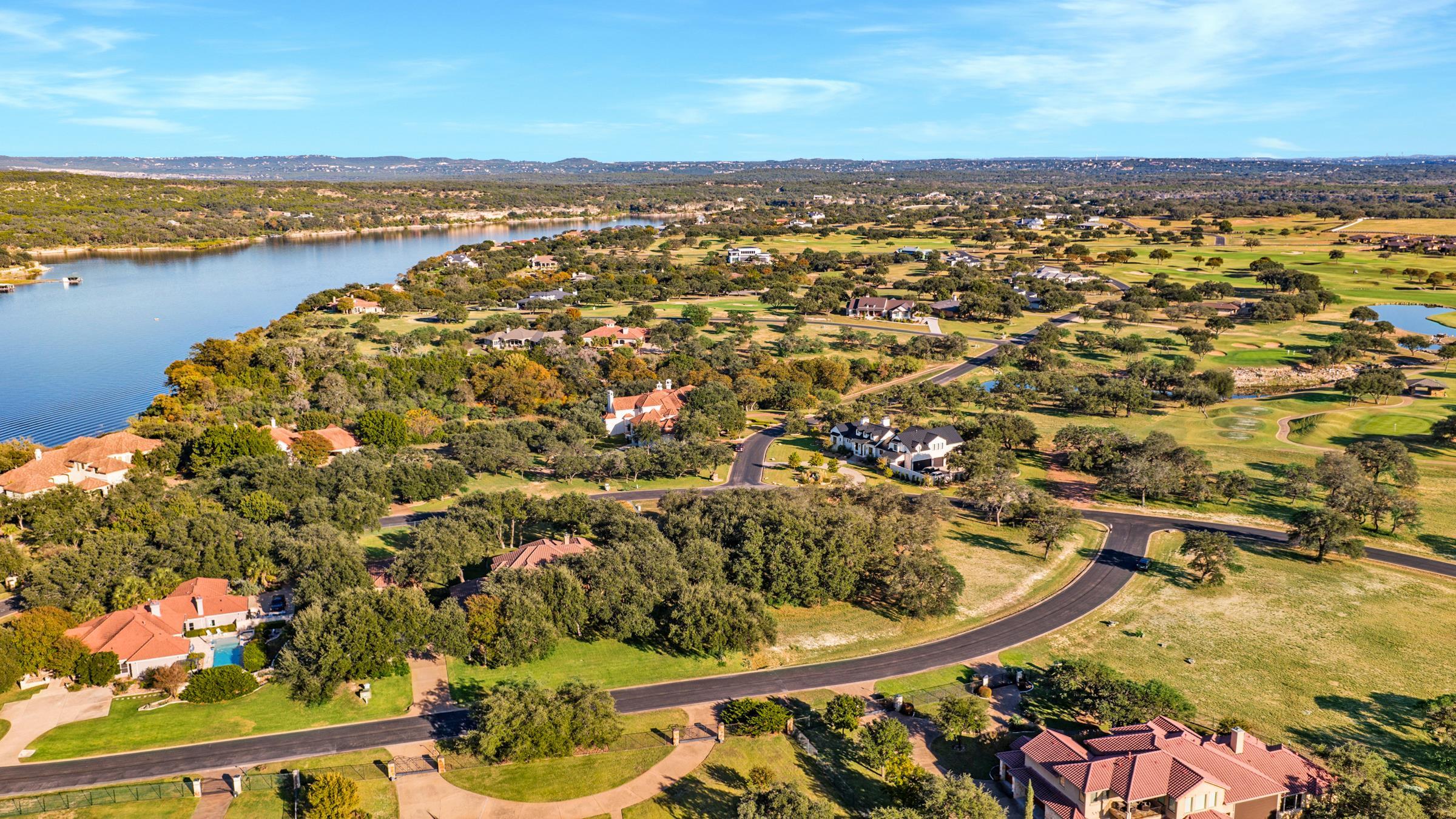 25700 Cliff Circle Spicewood, TX 78669 - Photo 20 of 25 an aerial view of residential houses with outdoor space
