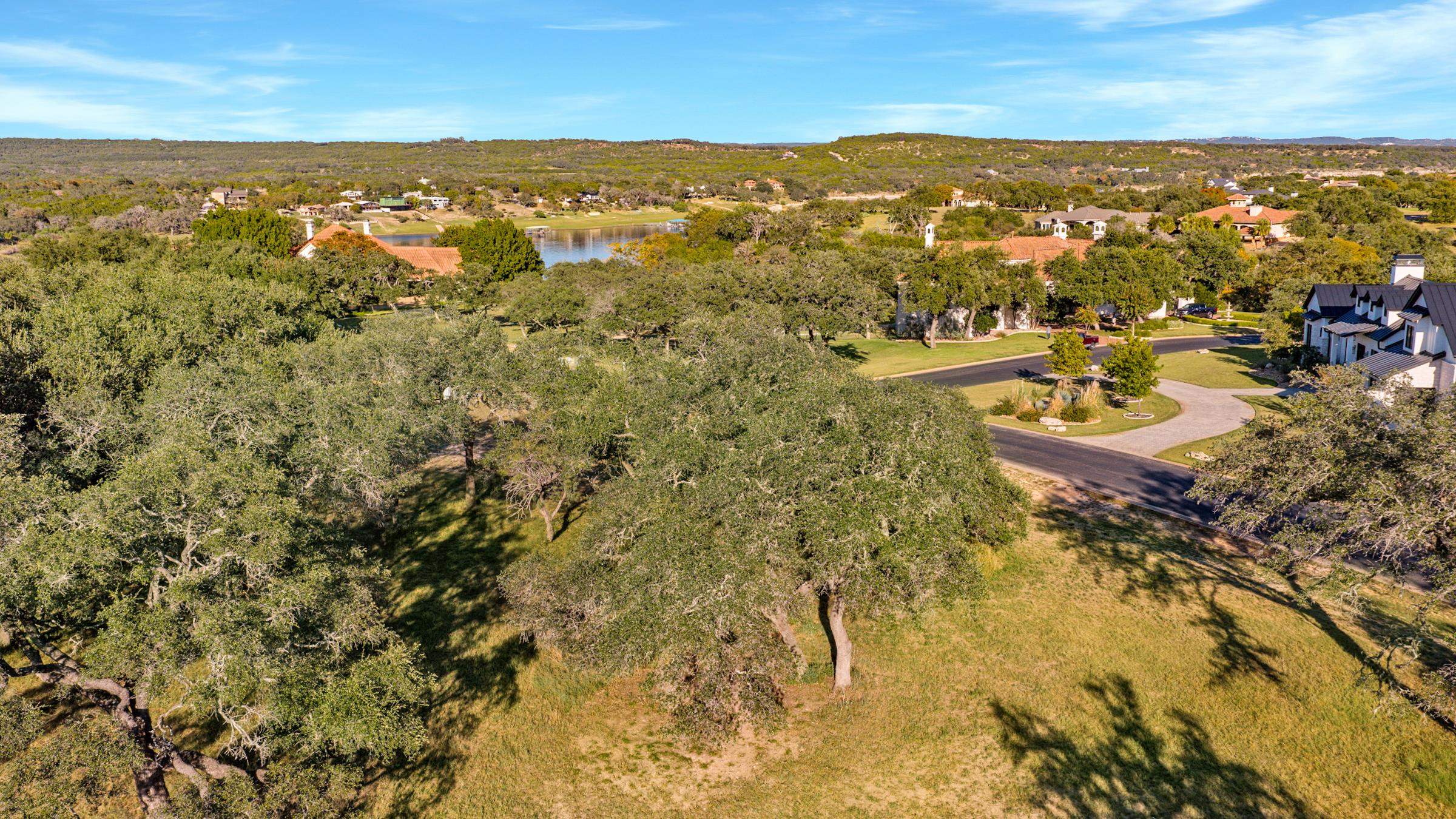 25700 Cliff Circle Spicewood, TX 78669 - Photo 24 of 25 an aerial view of residential houses with outdoor space