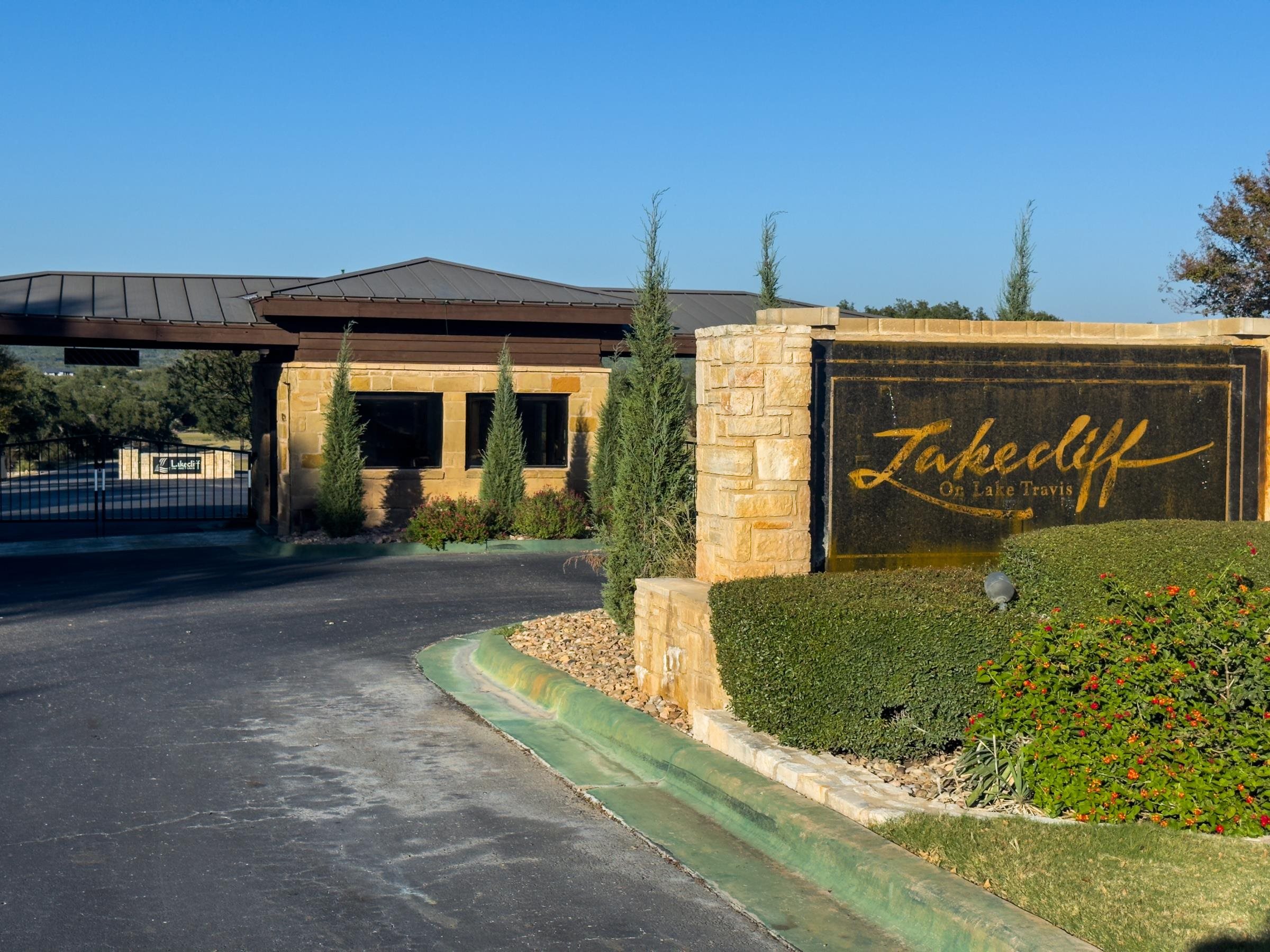 25700 Cliff Circle Spicewood, TX 78669 - Photo 3 of 25 a view of a house with a street