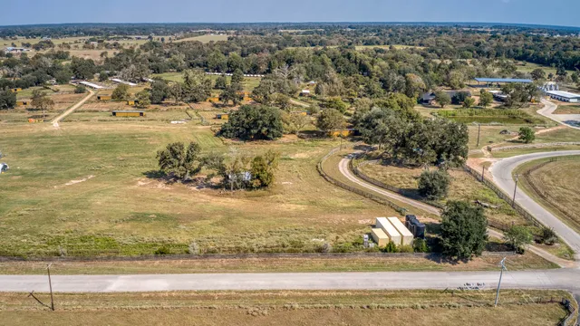 an aerial view of residential house with outdoor space