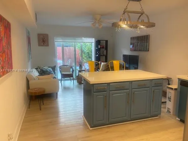 a bedroom with a bed and dresser