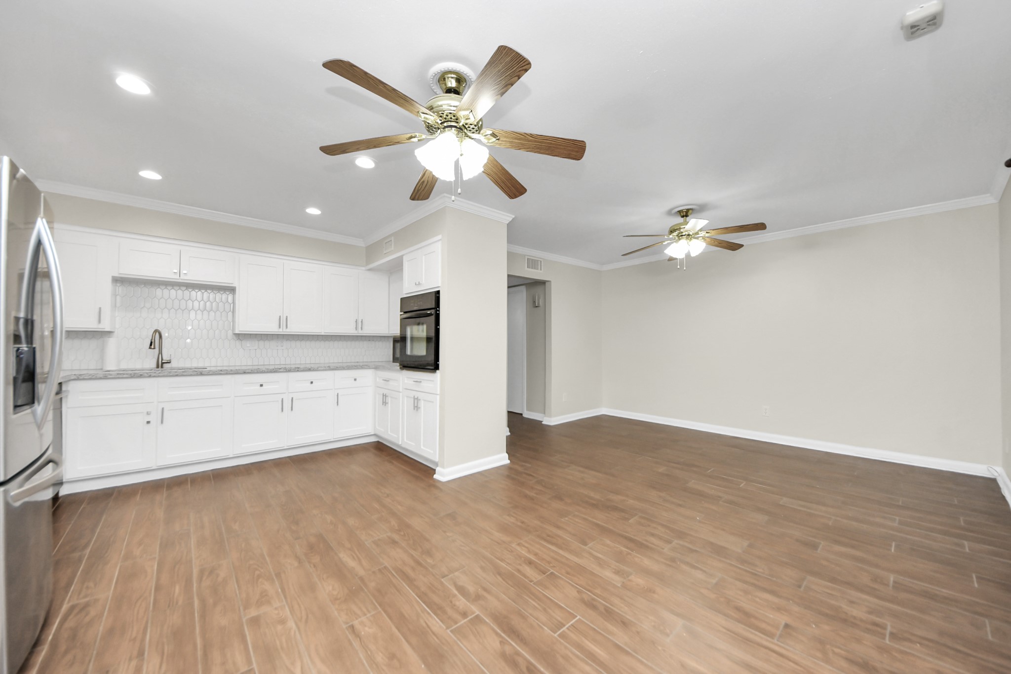 8234 Fondren Road, Unit 8234 Houston, TX 77074 - Photo 2 of 10 a view of a kitchen with marble kitchen and sink