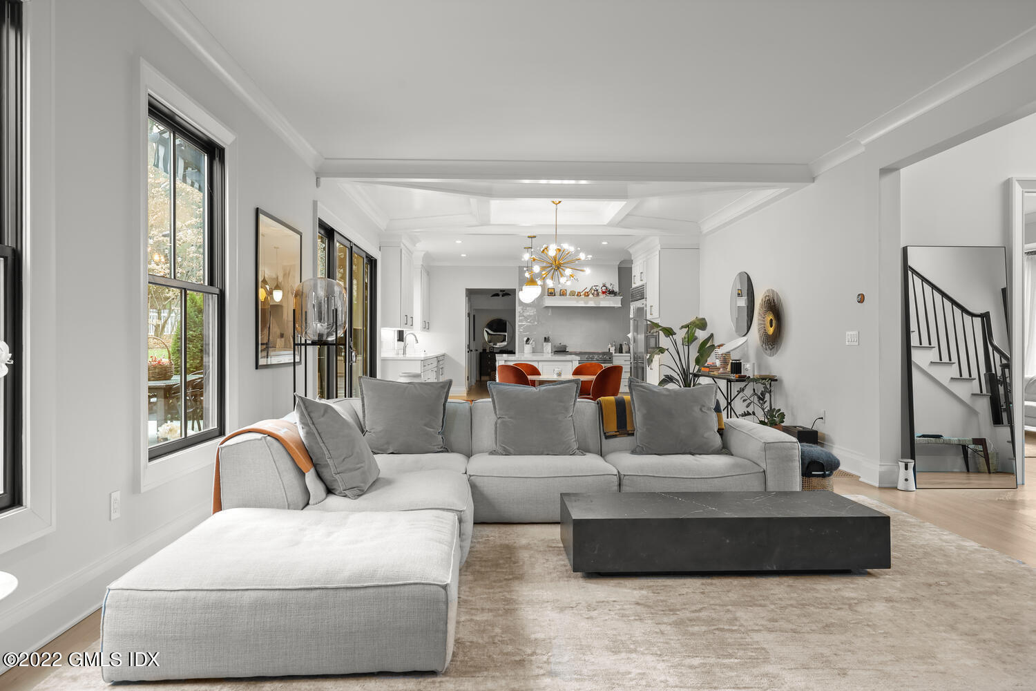 14 Copper Beech Road Greenwich, CT 06830 - Photo 14 of 48 a living room with furniture and a chandelier