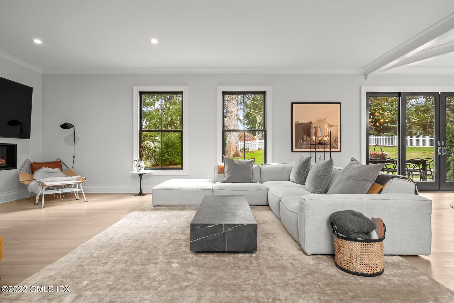 14 Copper Beech Road Greenwich, CT 06830 - Photo 15 of 48 a living room with furniture and a large window