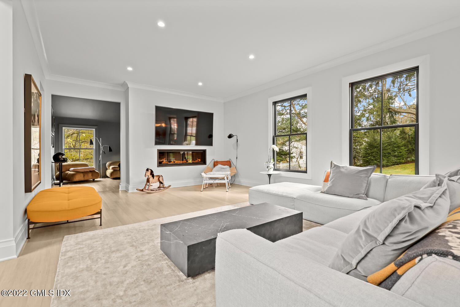 14 Copper Beech Road Greenwich, CT 06830 - Photo 16 of 48 a living room with furniture and a large window