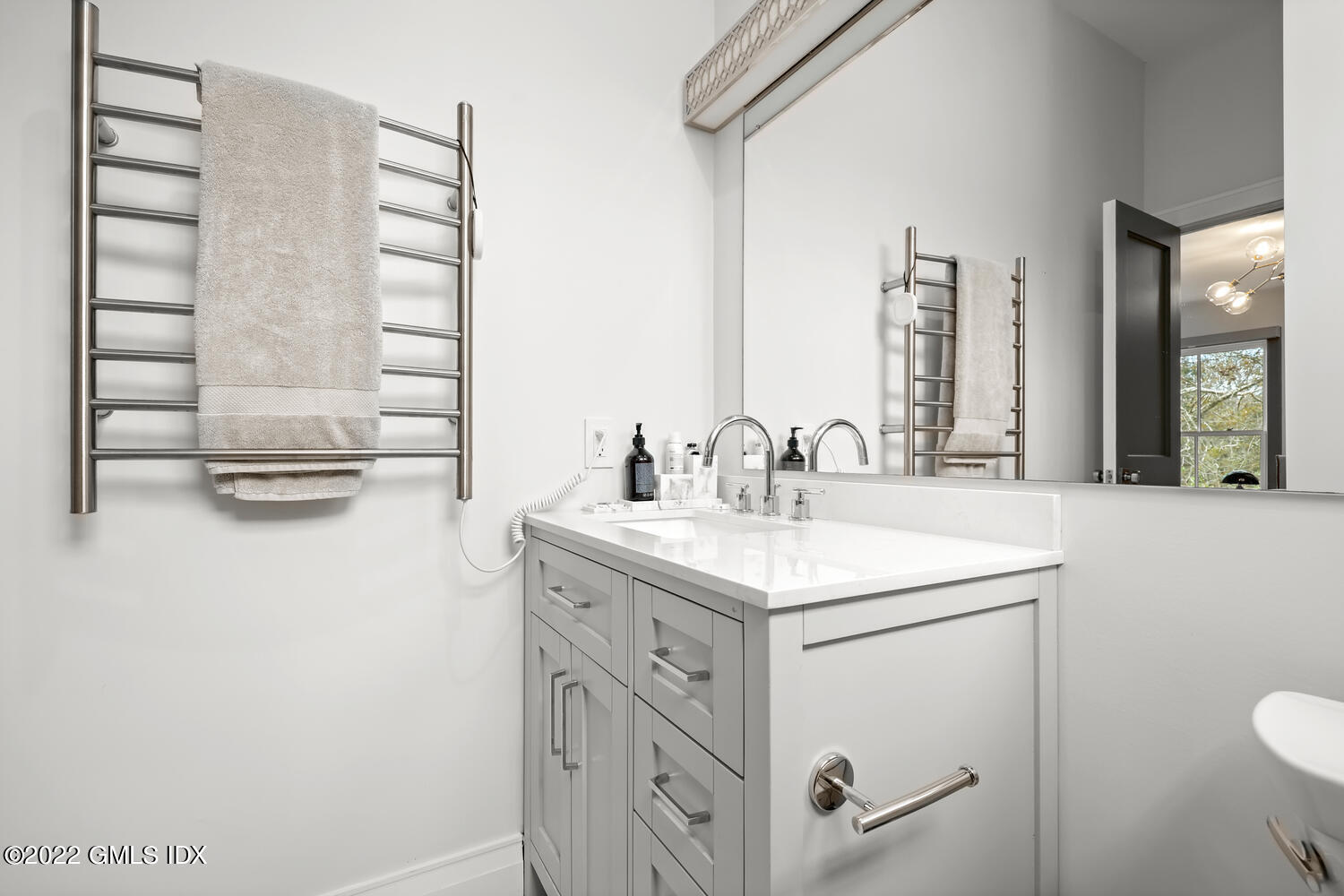 14 Copper Beech Road Greenwich, CT 06830 - Photo 23 of 48 a bathroom with a sink toilet and mirror