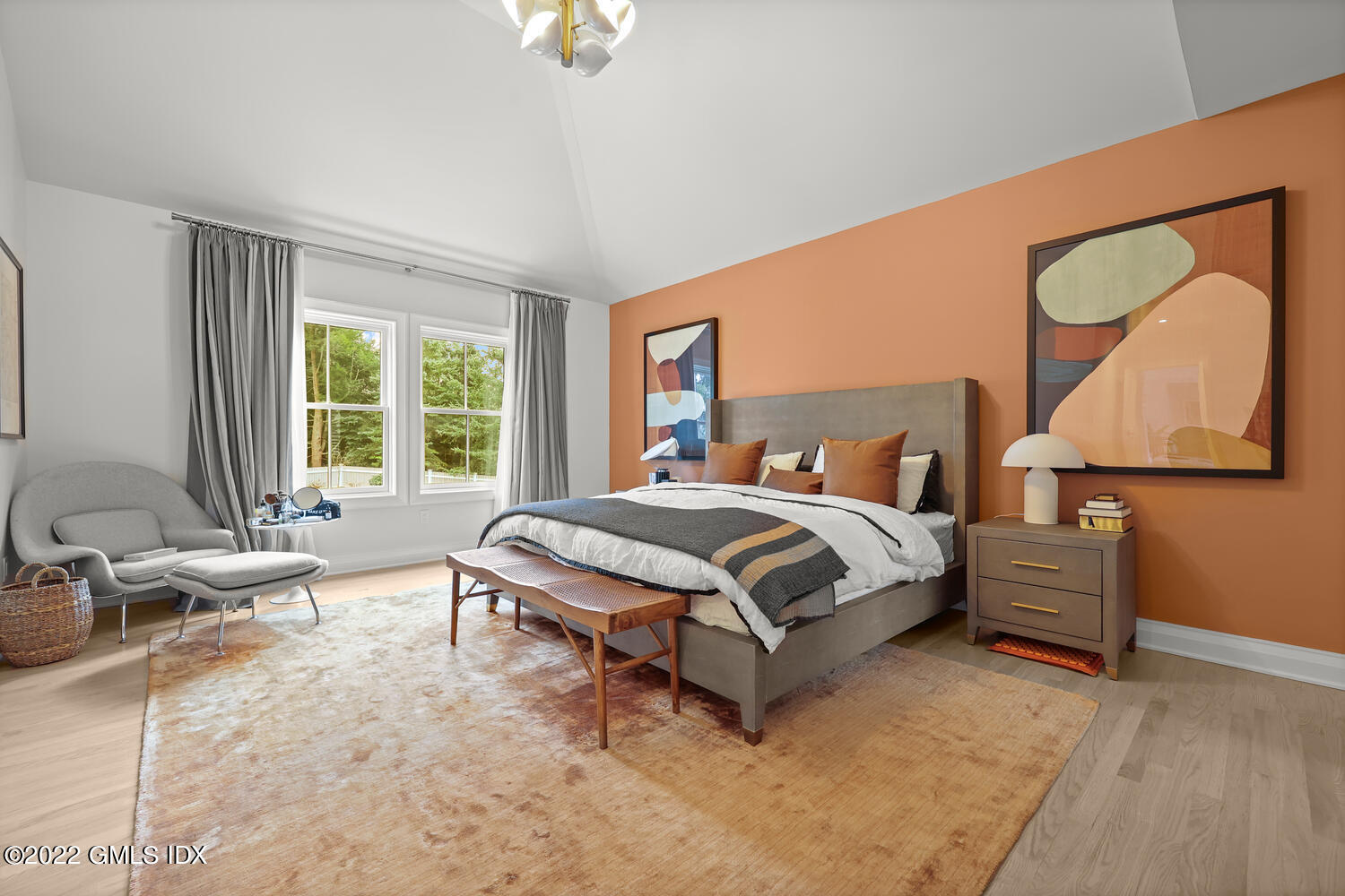 14 Copper Beech Road Greenwich, CT 06830 - Photo 27 of 48 a bedroom with a bed and wooden floor