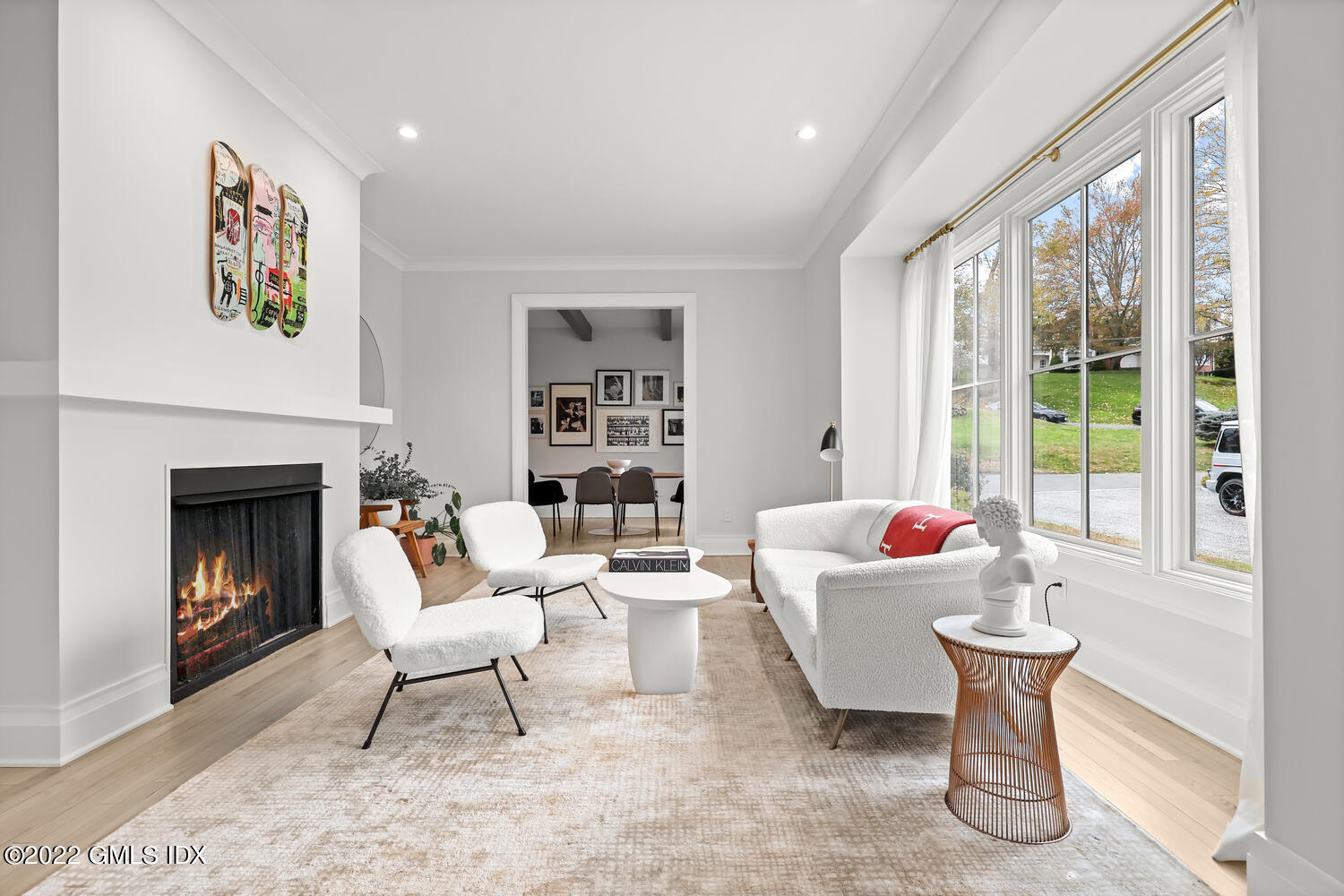 14 Copper Beech Road Greenwich, CT 06830 - Photo 3 of 48 a living room with furniture and a fireplace