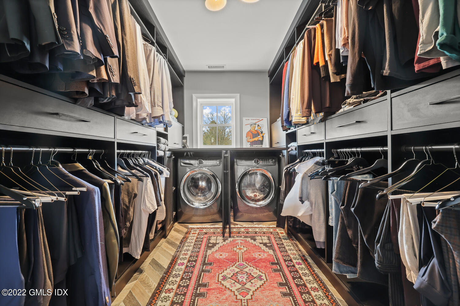 14 Copper Beech Road Greenwich, CT 06830 - Photo 31 of 48 a view of walk in closet with clothes and shoes