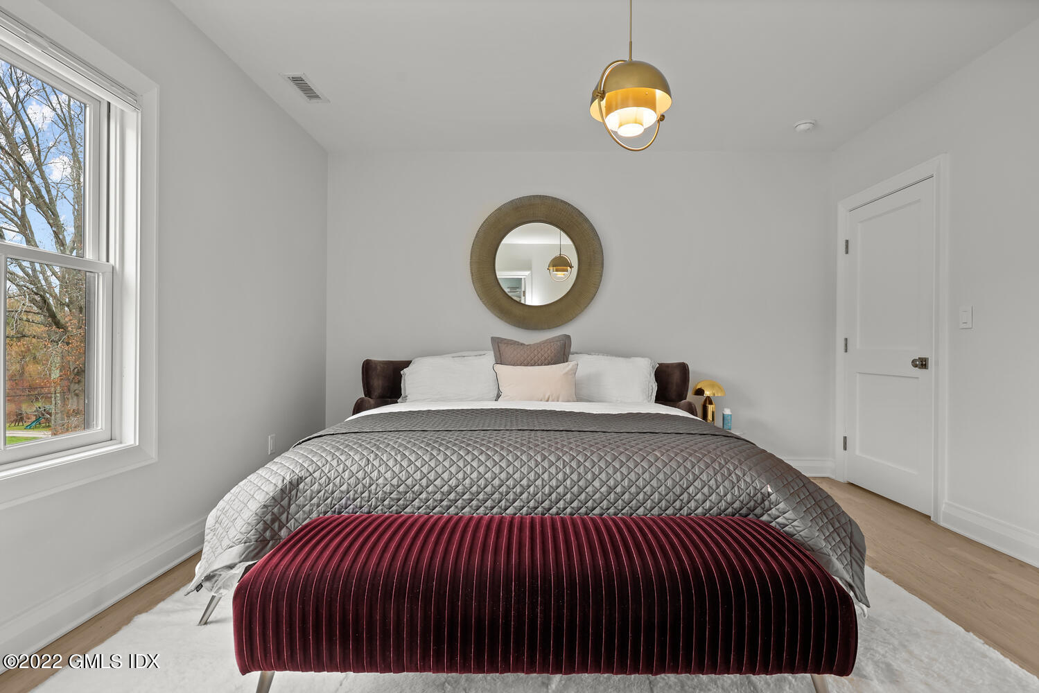 14 Copper Beech Road Greenwich, CT 06830 - Photo 34 of 48 a bedroom with a bed and a window