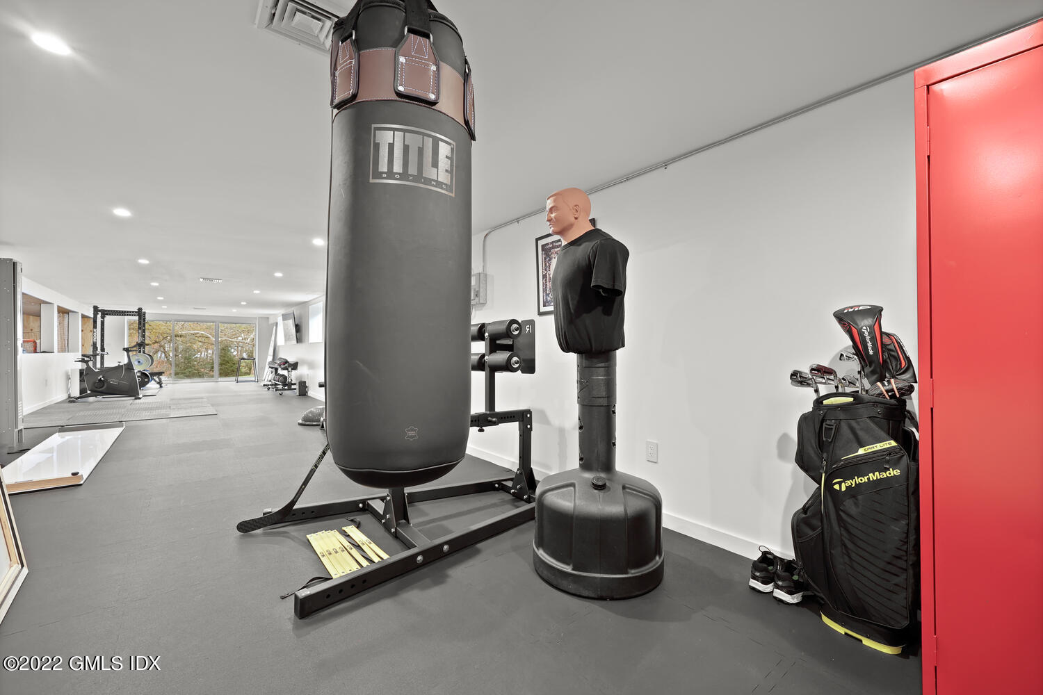 14 Copper Beech Road Greenwich, CT 06830 - Photo 37 of 48 a room with gym equipment and view of living room