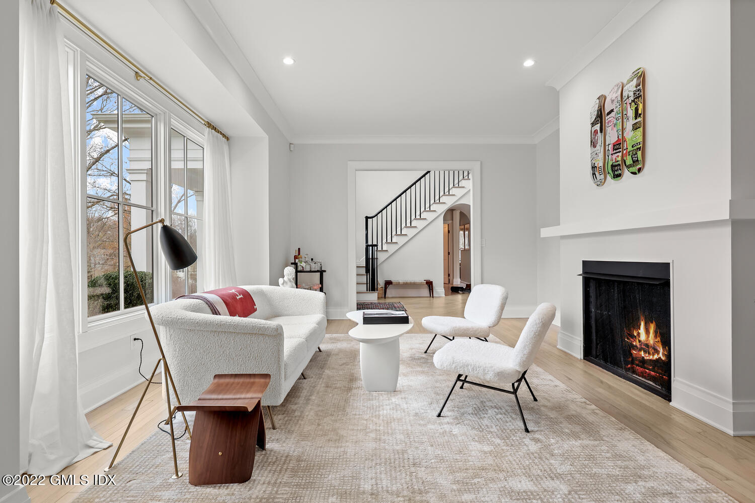 14 Copper Beech Road Greenwich, CT 06830 - Photo 5 of 48 a living room with furniture and a fireplace