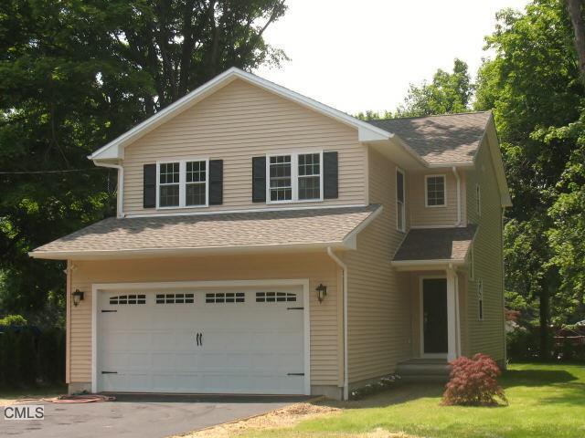 6391 Main Street Trumbull, CT 06611 - Photo 1 of 1 a view of a house with a yard and potted plants