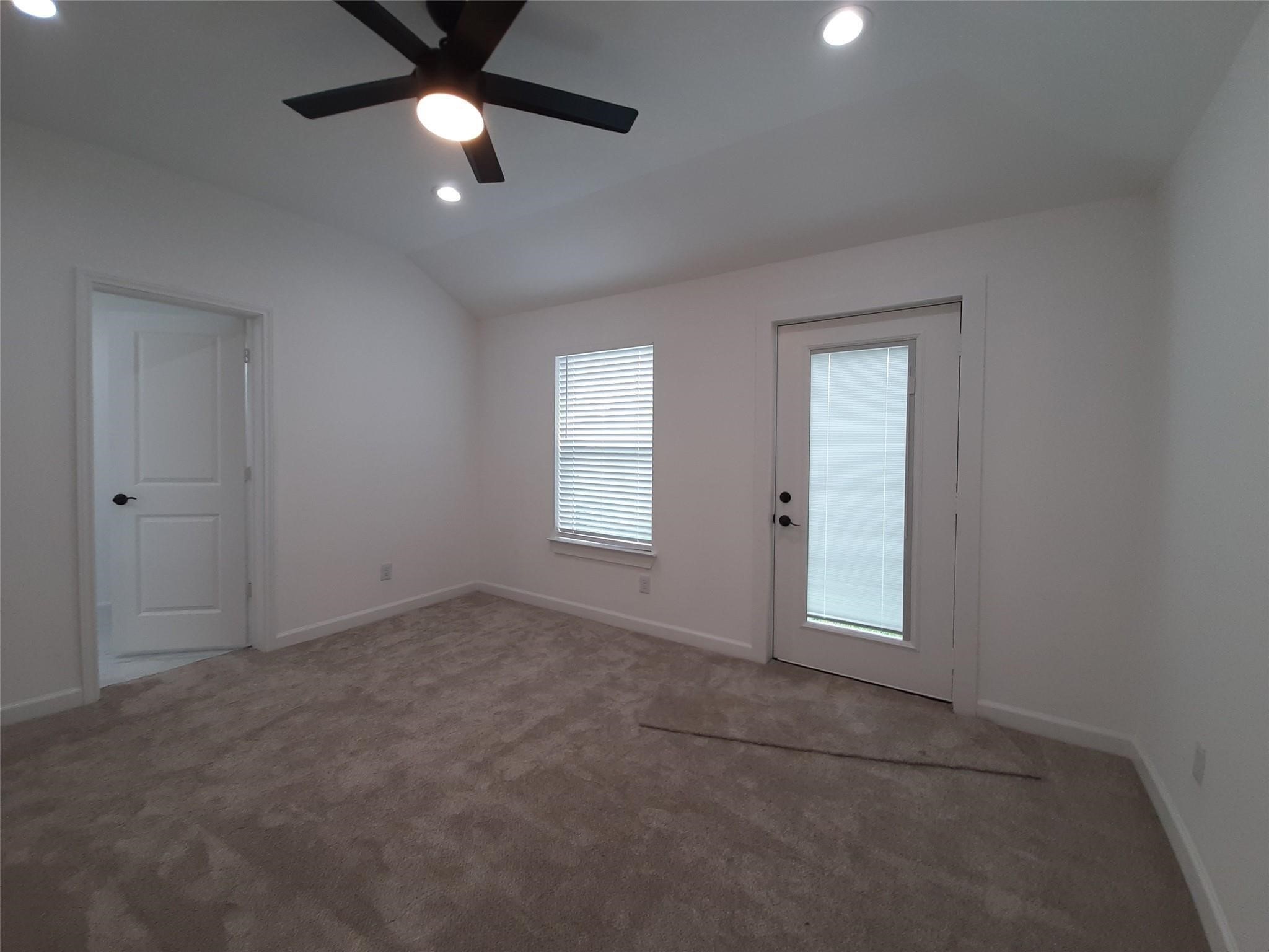 4530 Mayflower Street Houston, TX 77051 - Photo 11 of 21 an empty room with ceiling fan and window