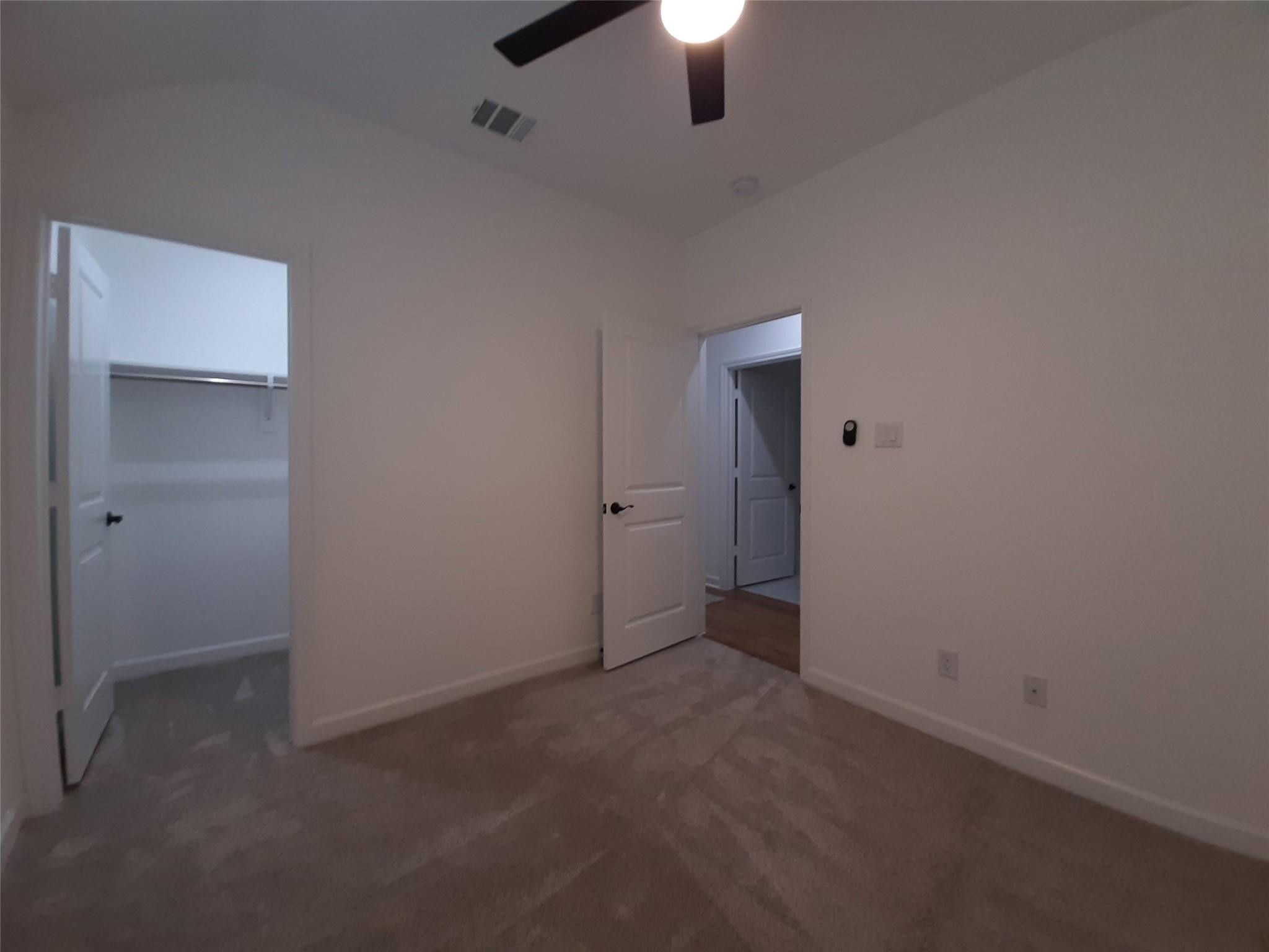 4530 Mayflower Street Houston, TX 77051 - Photo 14 of 21 an empty room with a empty space and a ceiling fan