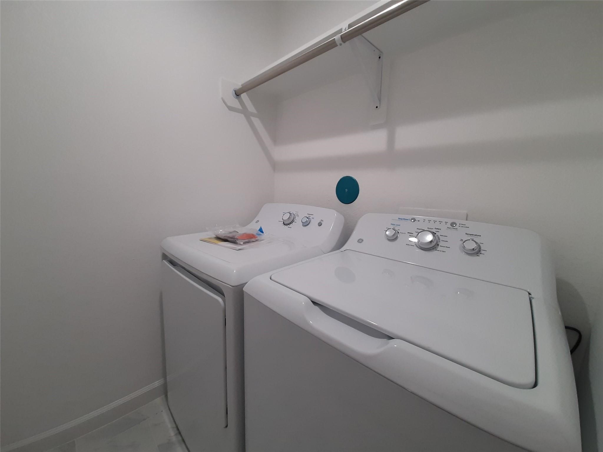 4530 Mayflower Street Houston, TX 77051 - Photo 17 of 21 a utility room with dryer and washer