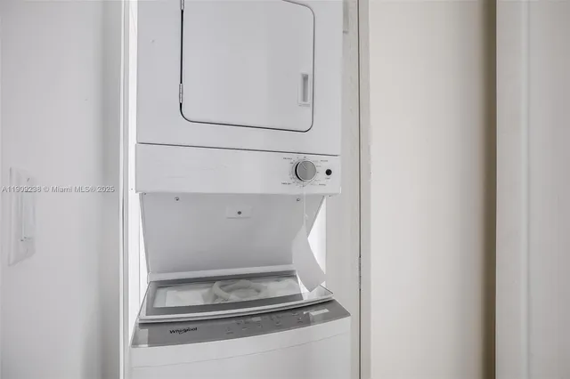 a bathroom with a sink a toilet and window