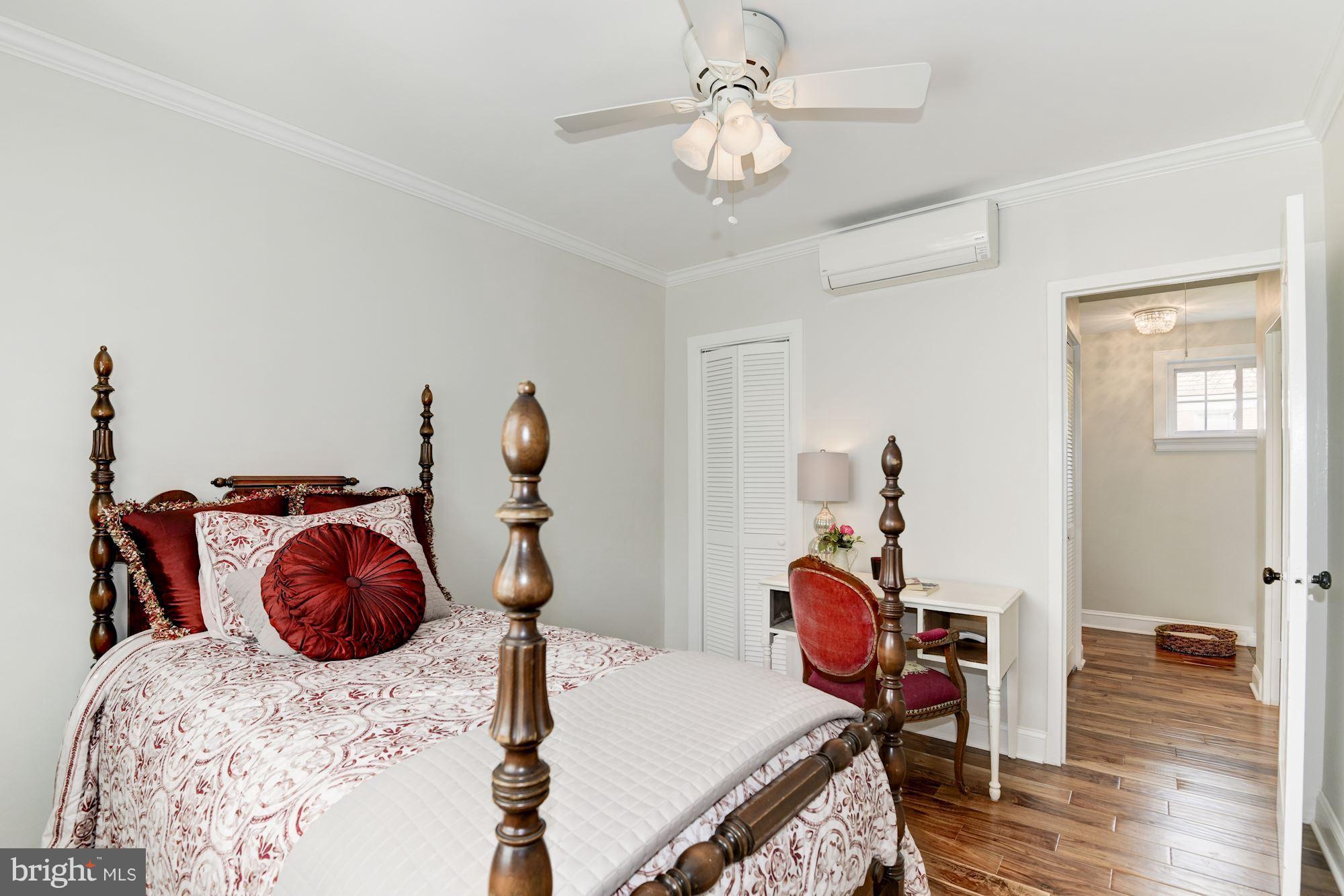 1656 Preston Road Alexandria, VA 22302 - Photo 11 of 29 a bedroom with a bed and wooden floor