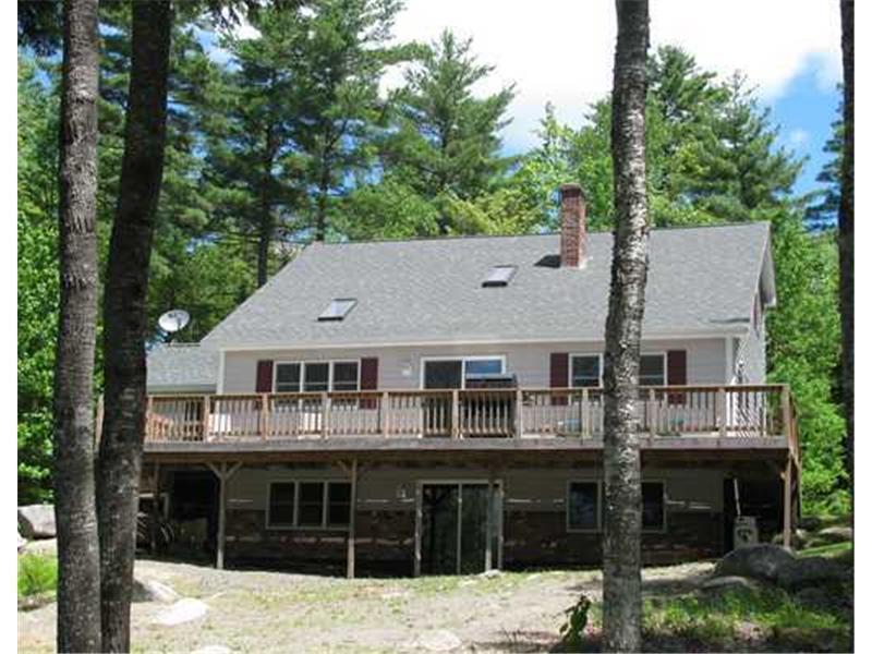 295 White Point Estates Road Lincoln, ME 04457 - Photo 1 of 30 Exterior Back. Sliding glass doors...