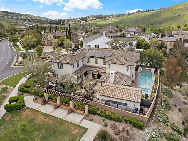 an aerial view of a house with a garden