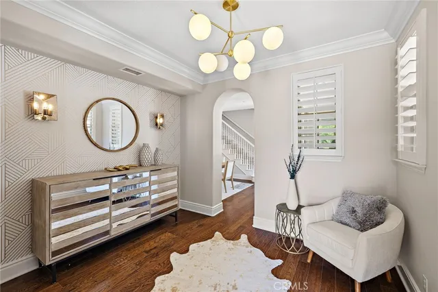 a view of a livingroom with furniture and a window