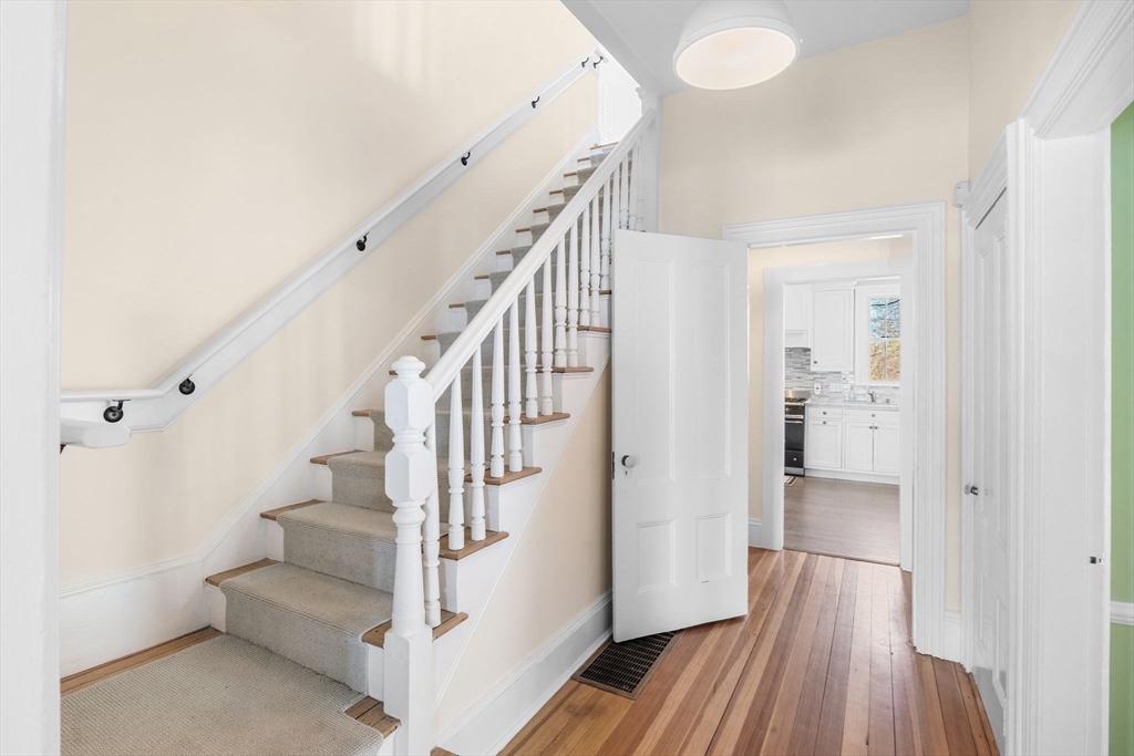 90 Puritan Road Swampscott, MA 01907 - Photo 22 of 42 a view of a hallway with wooden floor and entryway