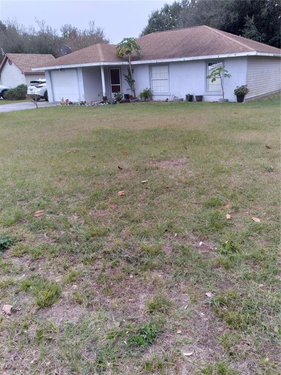 126 Tuscanooga Road Mascotte, FL 34753 - Photo 1 of 1 Front of House