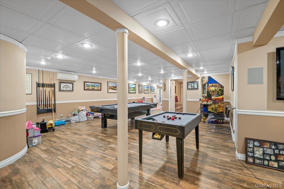 45 Coves Run Syosset, NY 11791 - Photo 32 of 43 a room with furniture and view of living room