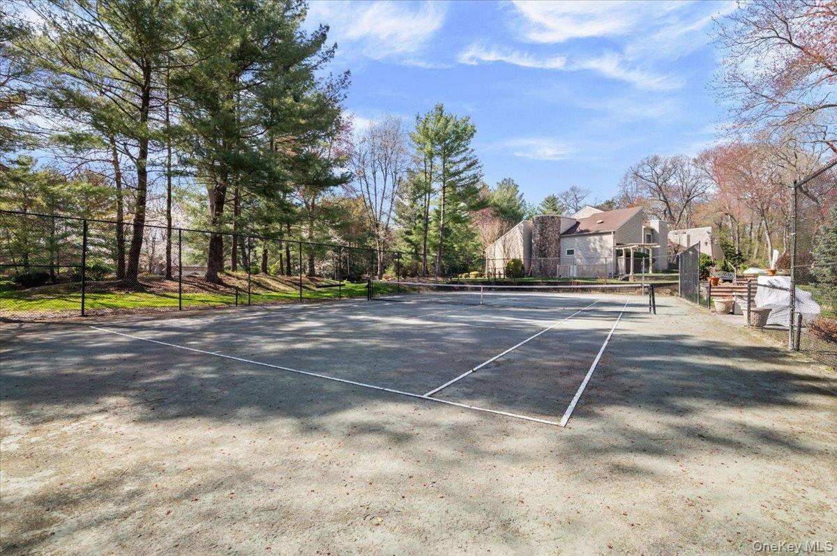 45 Coves Run Syosset, NY 11791 - Photo 40 of 43 a view of a playground with basketball court