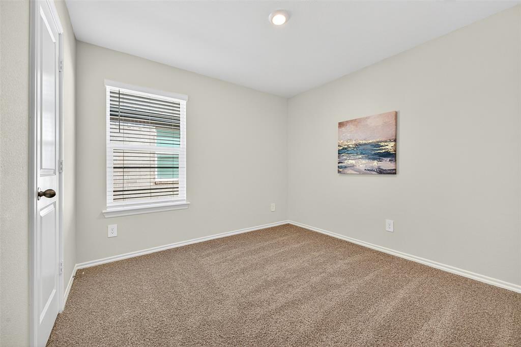 4208 Carnation Drive Sherman, TX 75090 - Photo 20 of 34 a view of an empty room with a window