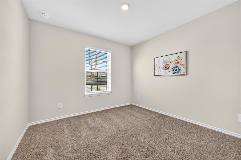 4208 Carnation Drive Sherman, TX 75090 - Photo 22 of 34 an empty room with a window