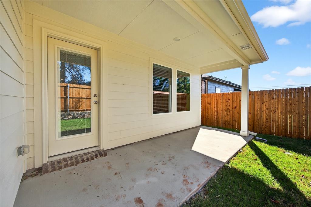 4208 Carnation Drive Sherman, TX 75090 - Photo 31 of 34 a front view of a house with garden